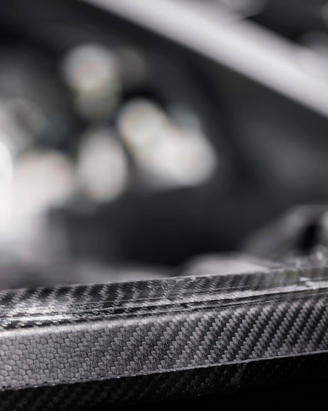 Detailed view over the Carbon fibre that covers a large part of the upper body of Polestar 1 