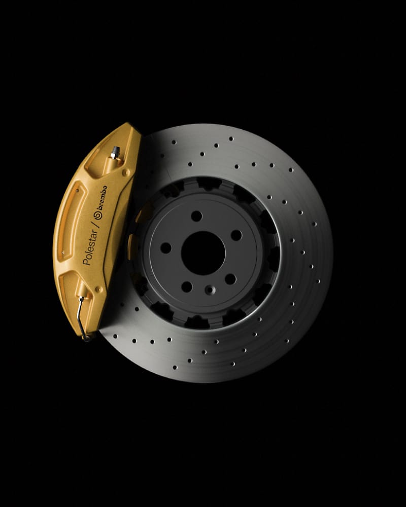 Black and yellow Brembo brake on black background