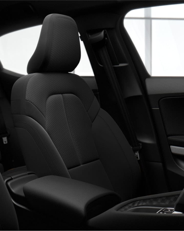 Dark textile seats inside the Polestar 2.