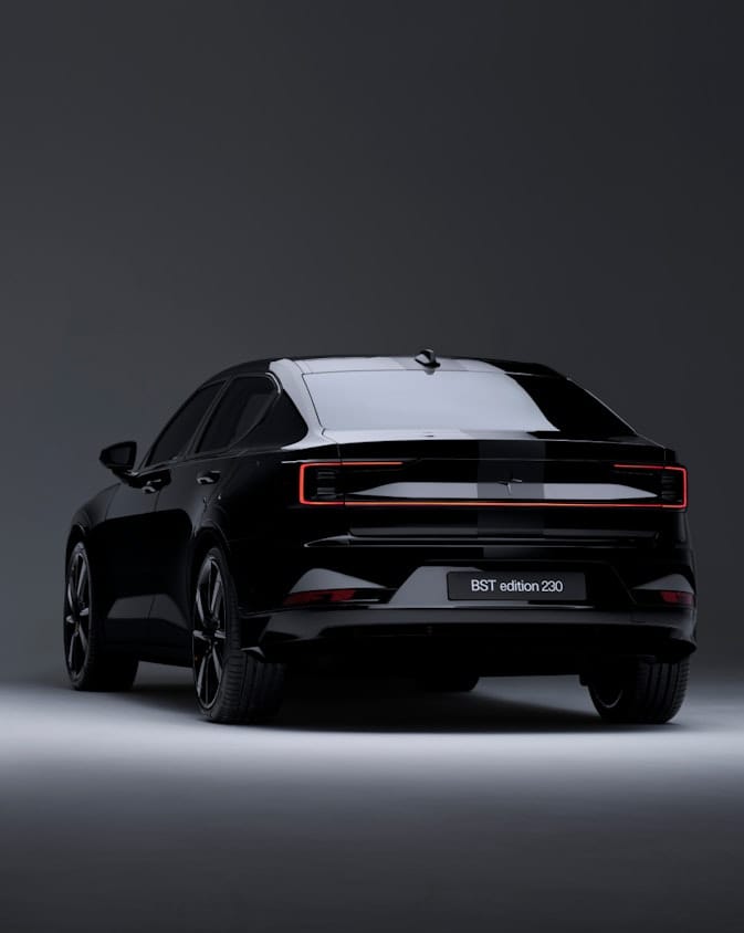 Black Polestar BST 230, shown from behind / rear