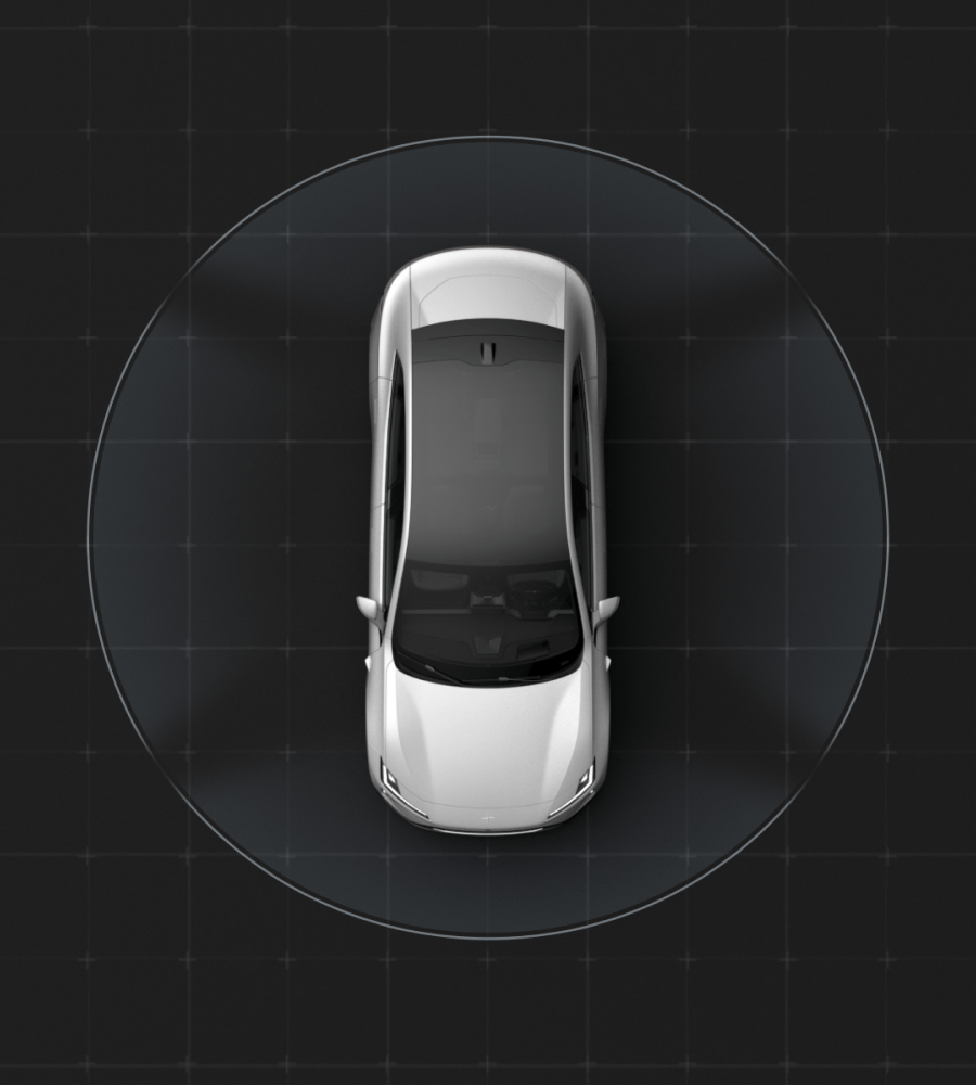 A white Polestar 4 shown from above. Black background and a white ring around