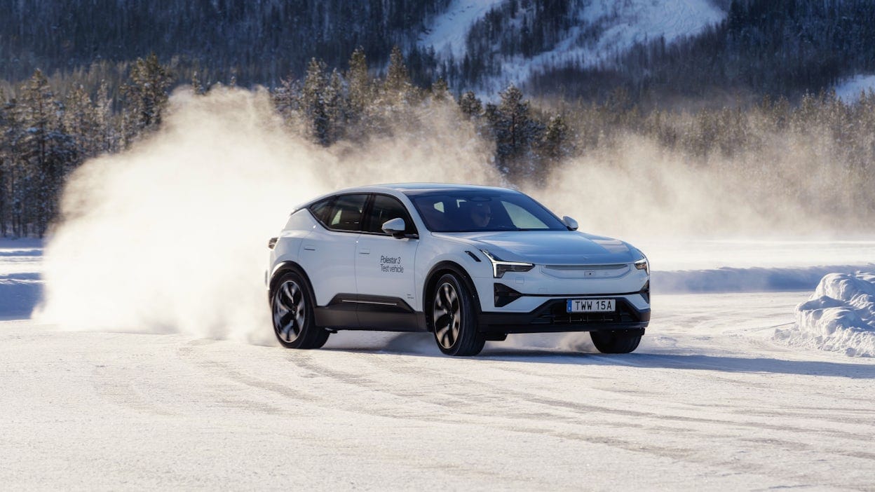 Polestar 3 in Snow colour driving on track on ice.