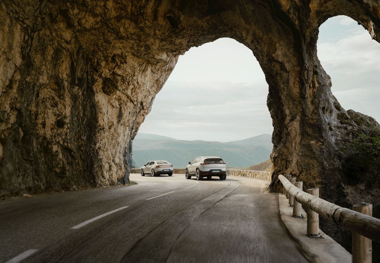 Polestar 2 and Polestar 3 driving on a scenic route.