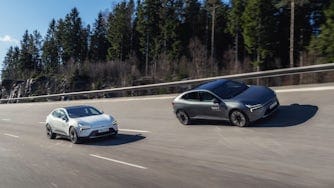 Two Polestar 4's driving on track.