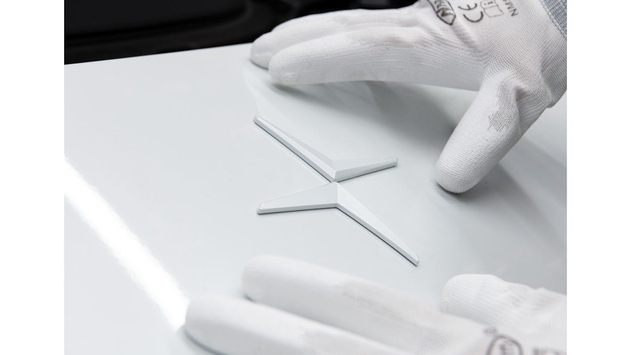 Close-up of Polestar logo during manufacturing phase.